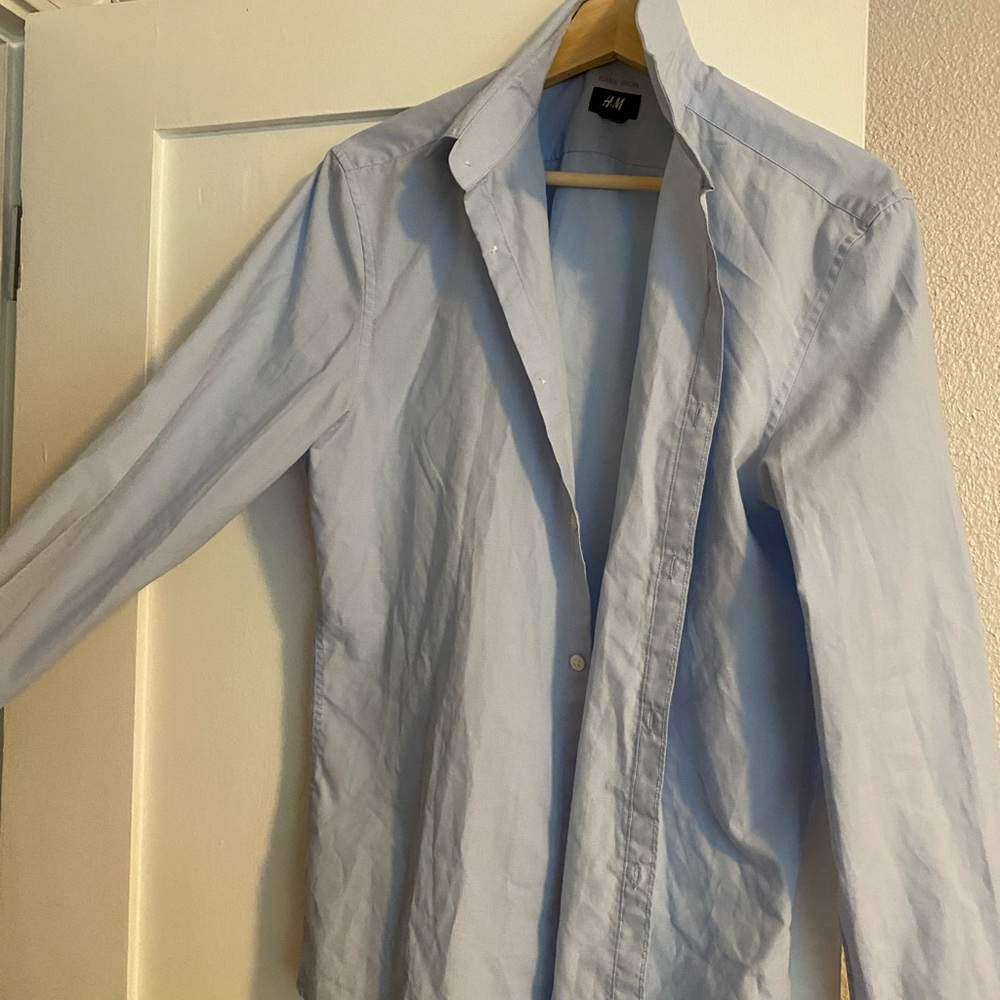 Light blue long H&M button-down dress shirt (no tag but I would say size Large)